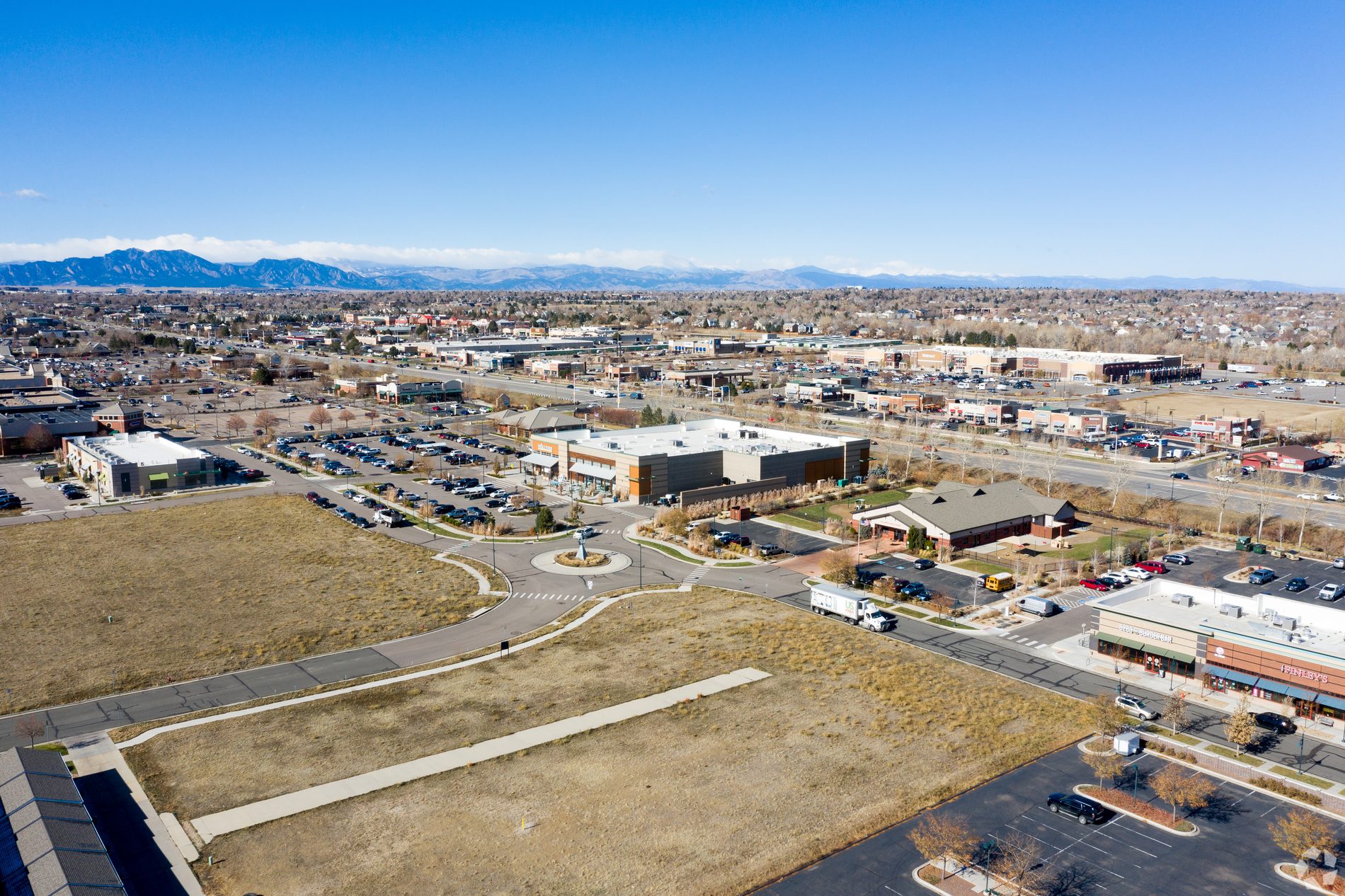 Aerial view of Bradburn Village with the Front Range beyond